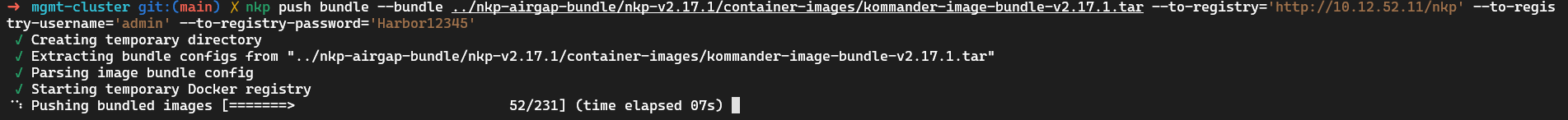 Terminal showing nkp push bundle in progress, pushing 52 of 231 bundled images to Harbor